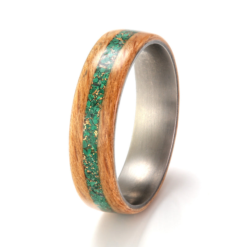 Beech wood ring with a titanium liner and a centred inlay of mixed malachite, moonstone, flint and gold shavings | 6mm wide