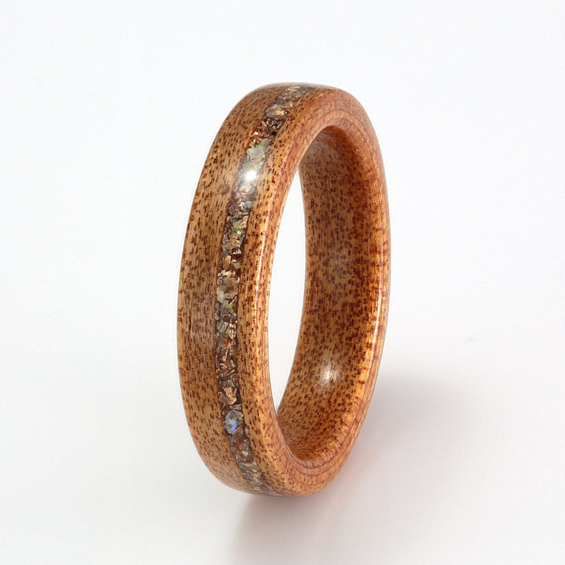 New Zealand engagement ring | Kauri wood ring with an off centre inlay of paua shell | 4mm wide | by Eco Wood Rings